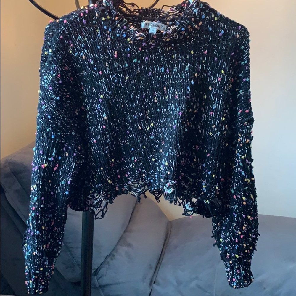 Distressed rainbow Pom Pom knit sweater